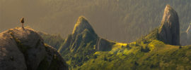 woman standing in the mountains