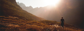 Man walking into the hills