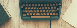 Manual typewriter and notebook