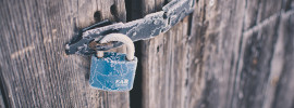 Padlock on barn doors