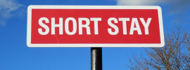 Sign reading SHORT STAY